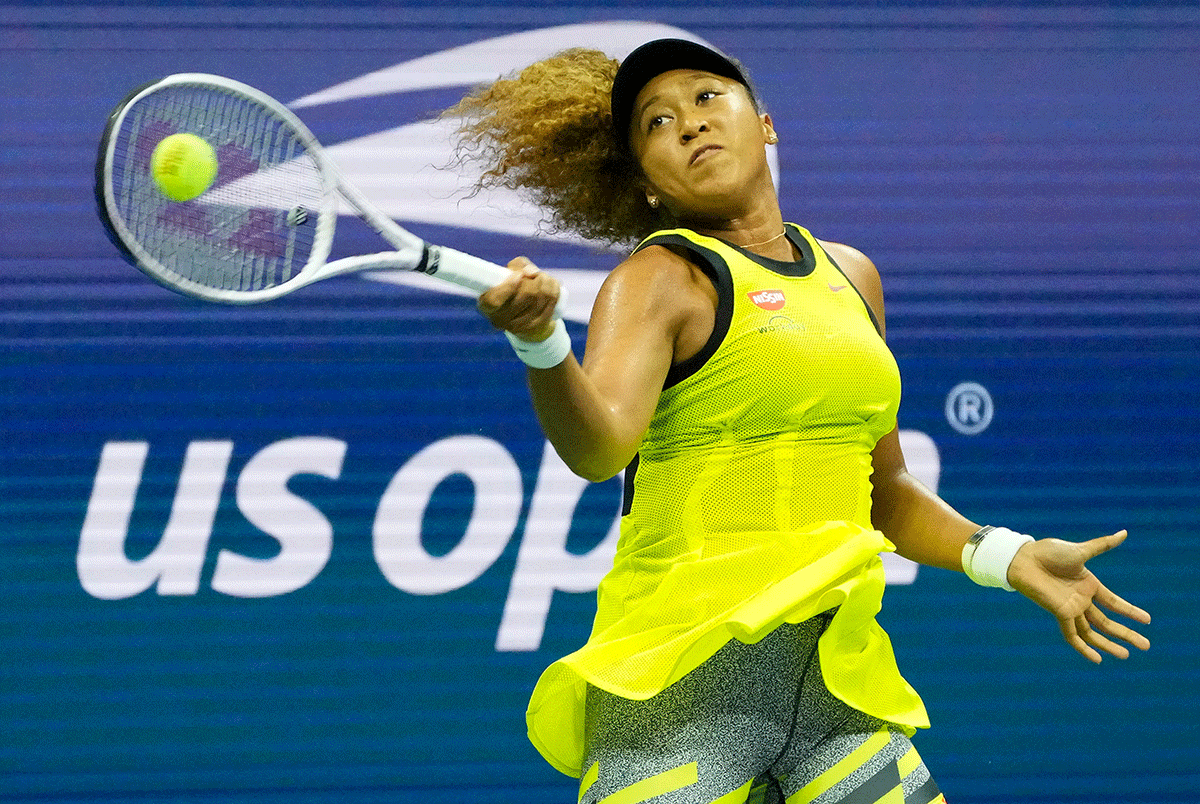 Japan's Naomi Osaka plays a return against Czech Republic's Marie Bouzkova