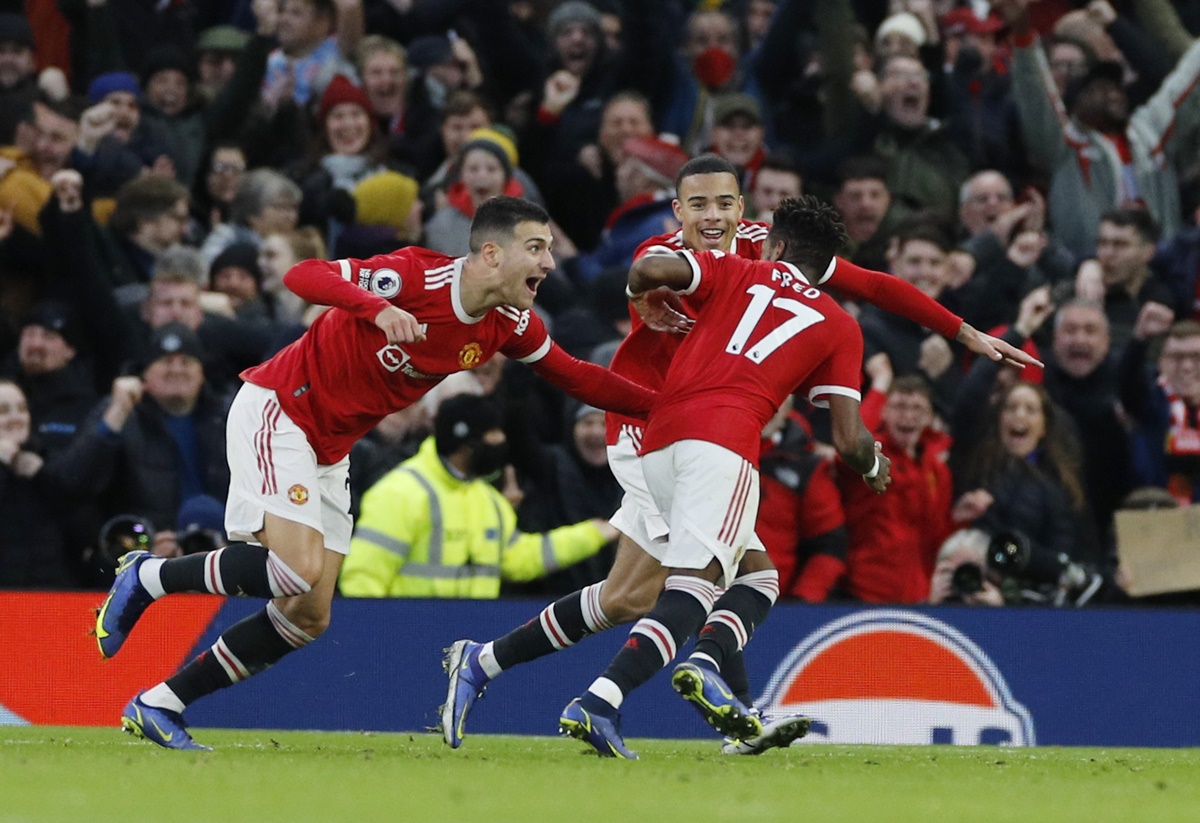 Fred celebrates with Mason Greenwood and Diogo Dalot after scoring what turned out to be the match-winner for Manchester United in the Premier League match against Crystal Palace, at Old Trafford, Manchester, on Sunday.