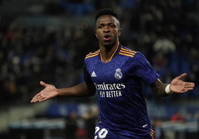 Vinicius Junior celebrates scoring Real Madrid's first goal against Real Sociedad, at Reale Arena, San Sebastian, Spain, on Saturday.