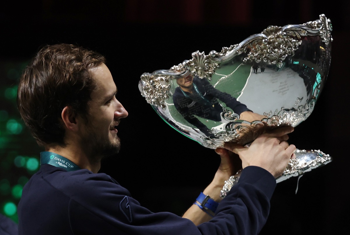 The Russian Tennis Federation's Daniil Medvedev hoists the Trophy.