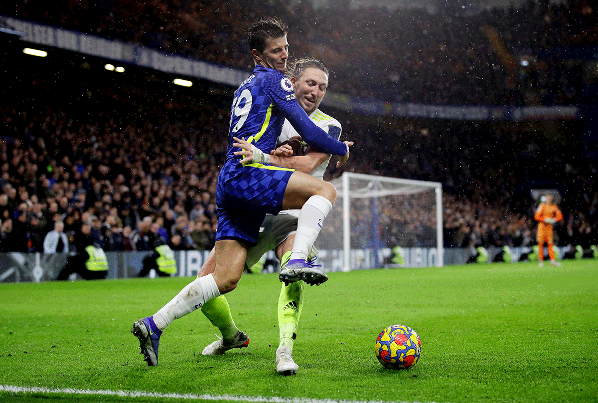 Chelsea's Mason Mount and Leeds United's Luke Ayling vie for possession 