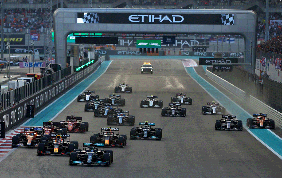 Mercedes' Lewis Hamilton leads Red Bull Racing's Max Verstappen and the rest of the field at the start of the race. Photograph: Mark Thompson/Getty Images