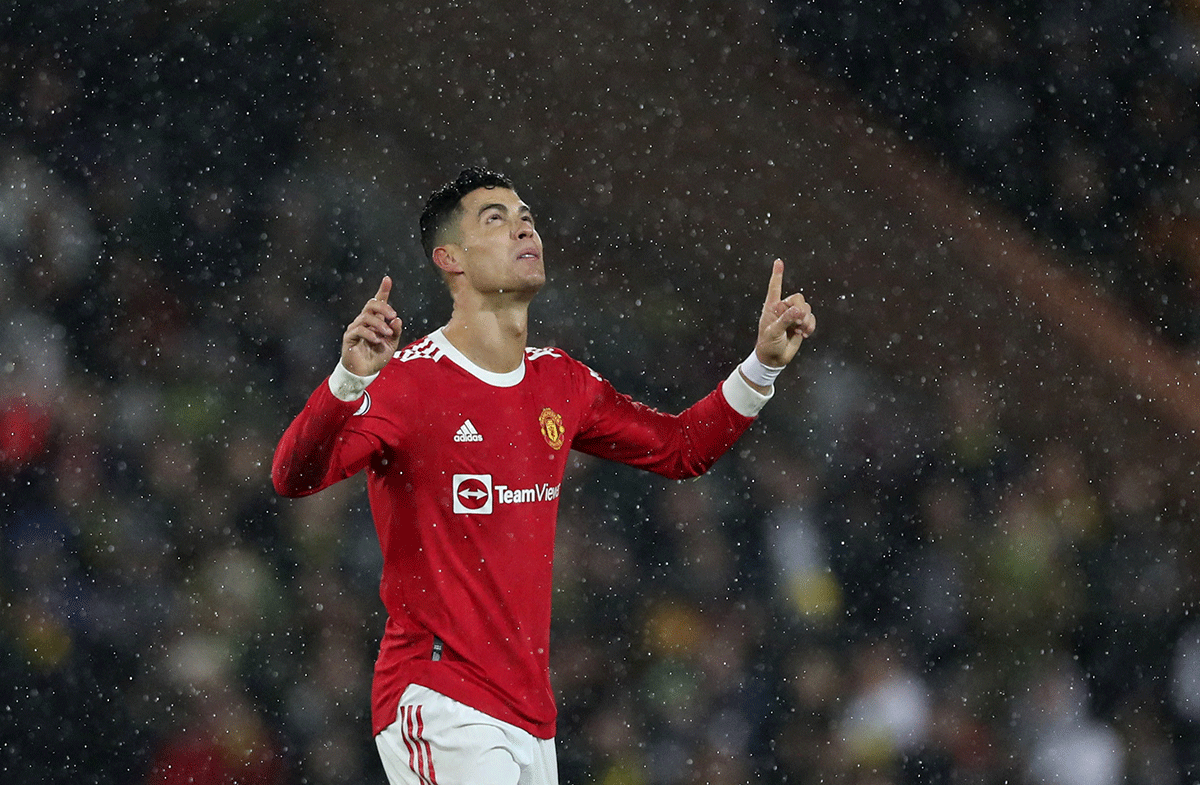 Manchester United's Cristiano Ronaldo celebrates scoring their first goal from the penalty spot against Norwich at Carrow Road in Norwich on Saturday 