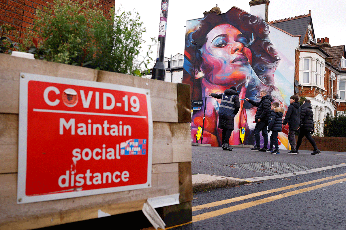 Fans outside the stadium at Selhurst Park in London before an EPL match on Sunday. England's top-flight is in the midst of its busiest time of the season, with teams involved in the League Cup playing at least twice a week until the first week of January and further cancellations could leave an unwelcome fixture pile-up.