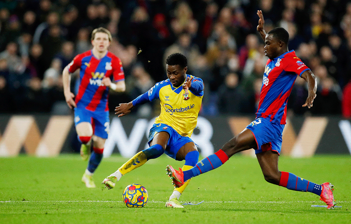 Southampton's Nathan Tella in action with Crystal Palace's Tyrick Mitchell