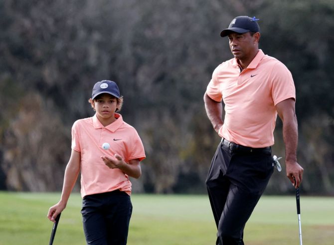 Tiger Woods with son Charlie. Tiger is expected to play the British Open