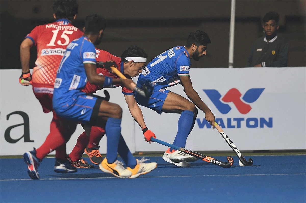 Action from the Asian Champions Trophy semi-final between India and Japan in Dhaka on Tuesday