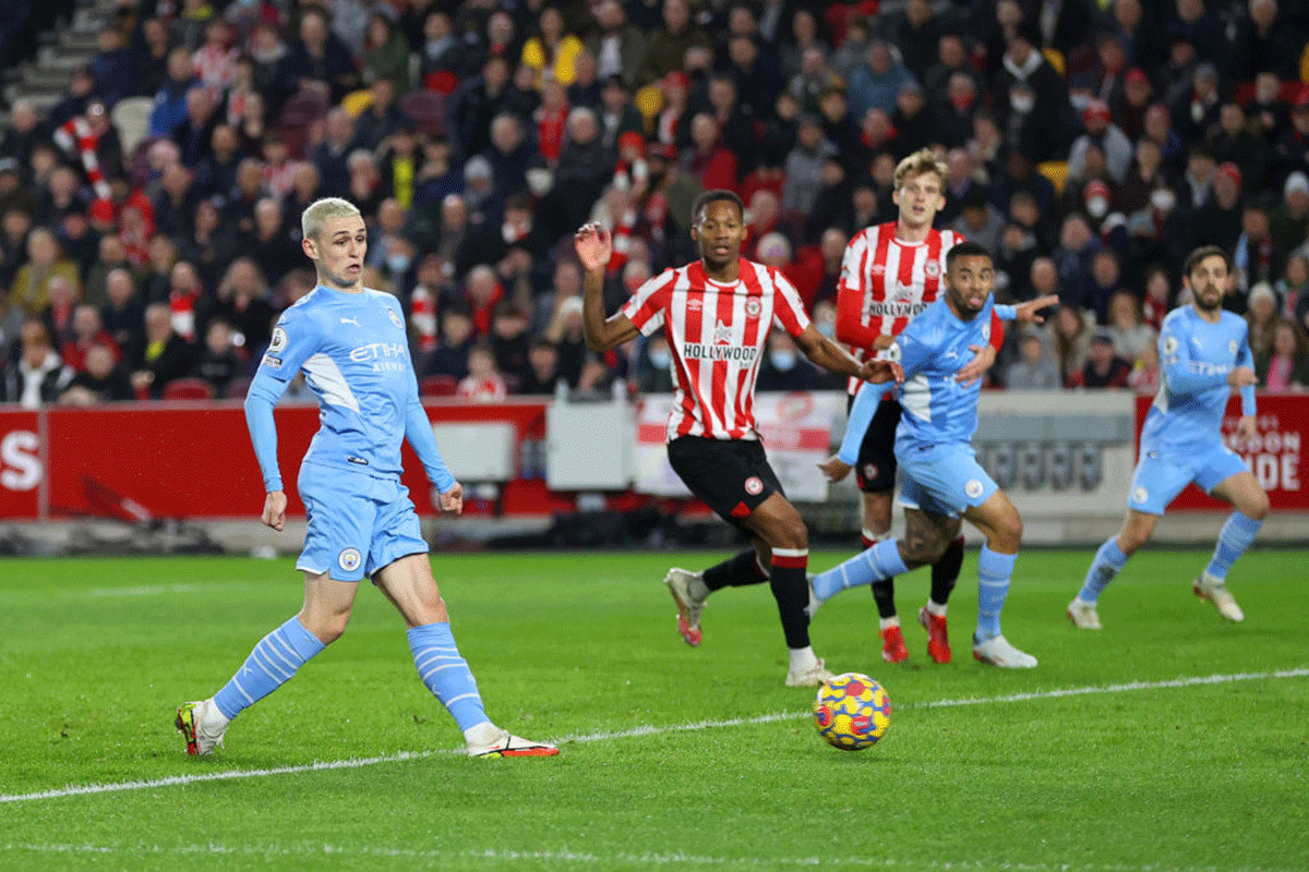 Manchester City's Phil Foden scores against Brentford at Brentford Community Stadium in Brentford