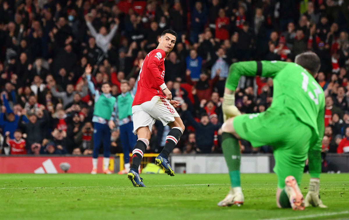 Manchester United's Cristiano Ronaldo celebrates after scoring their third goal against Burnley at Old Trafford in Manchester on Thursday