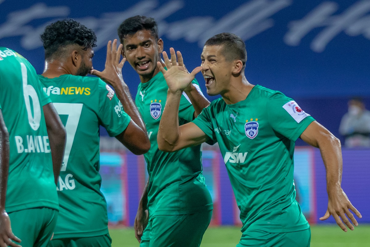 Bengaluru's Cleiton Silva celebrates with his teammates