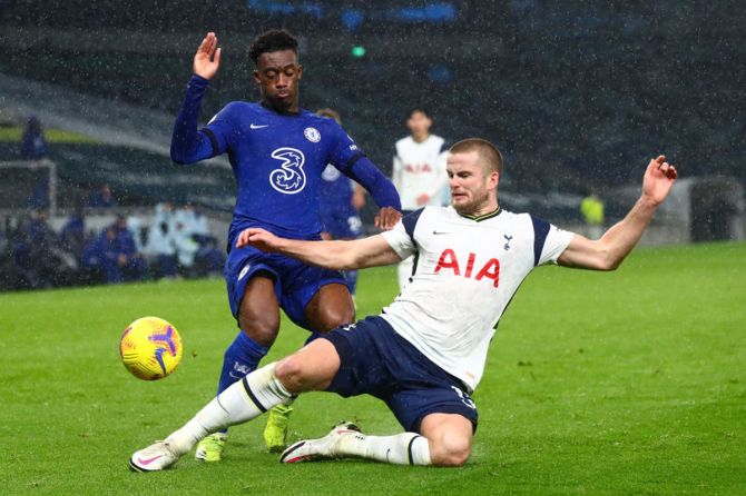 Chelsea's Callum Hudson-Odoi is challenged by Tottenham Hotspur's Eric Dier.