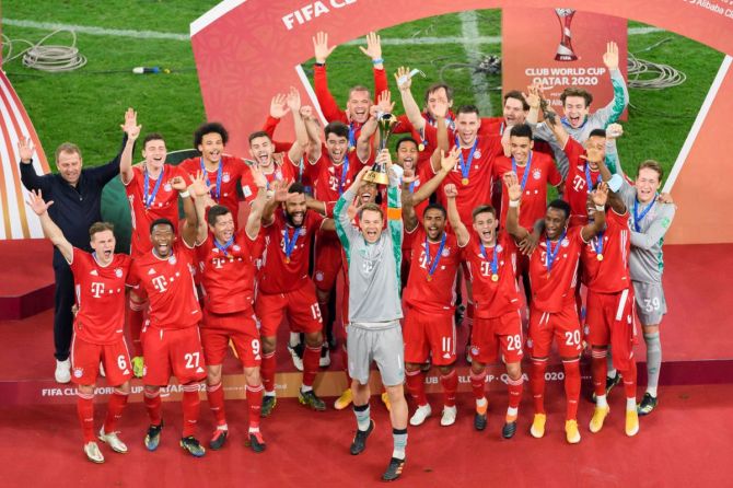 FC Bayern Munich captain Manuel Neuer celebrates with his team on winning the FIFA Club World Cup Qatar 2020 trophy in Doha, Qatar, on Friday