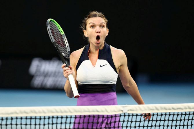 Romania' Simona Halep reacts during her third round match against Russia's Veronika Kudermetova