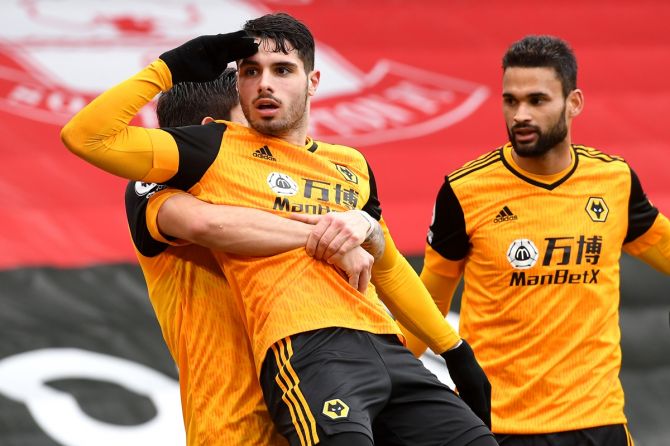 Pedro Neto  celebrates after scoring Wolverhampton Wanderers's second goal with teammate Ruben Neves against Southampton