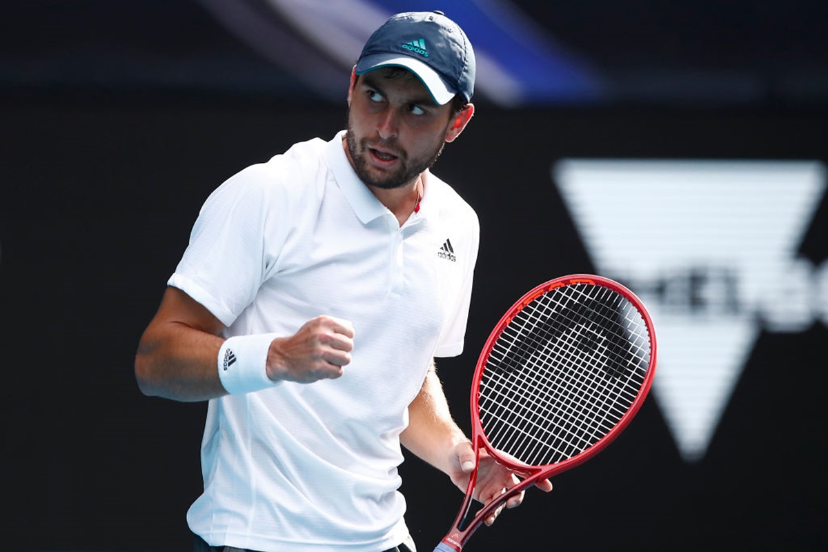 Russia's Aslan Karatsev celebrates after winning a point during his quarter-final against Bulgaria's Grigor Dimitrov