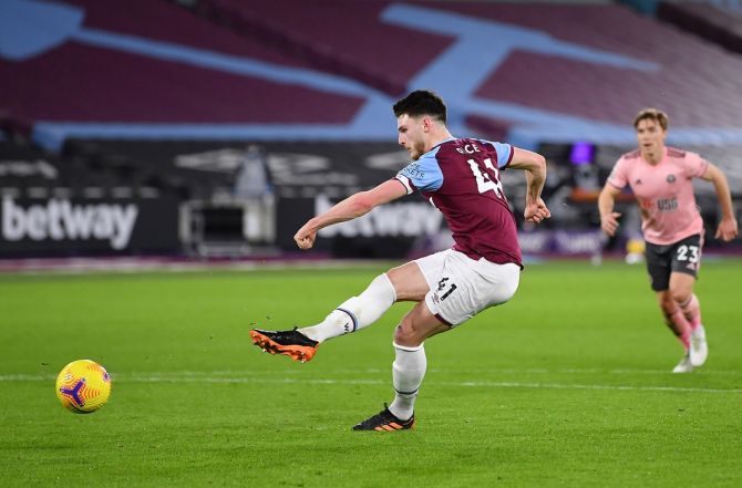 Declan Rice scores West Ham United's first goal from the penalty spot against Sheffield United, at London Stadium.