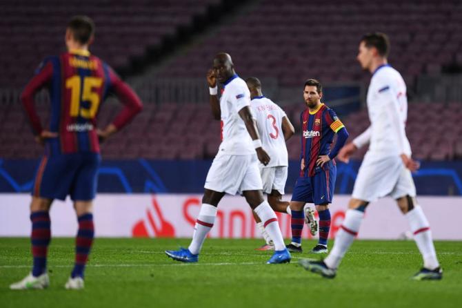 FC Barcelona's Lionel Messi reacts after conceding their fourth goal