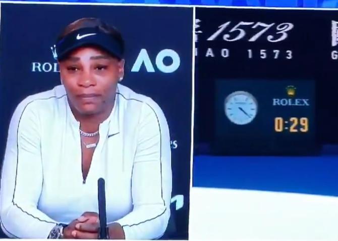 Serena Williams holds back tears while answering questions during a press conference after her semi-final loss to Naomi Osaka at the Australian Open in Melbourne on Thursday 