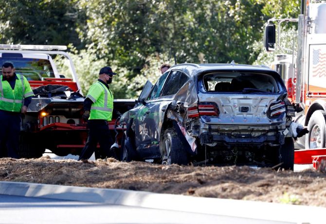 The damaged car of Tiger Woods is towed away after he was involved in a car crash, near Los Angeles, California, on Tuesday