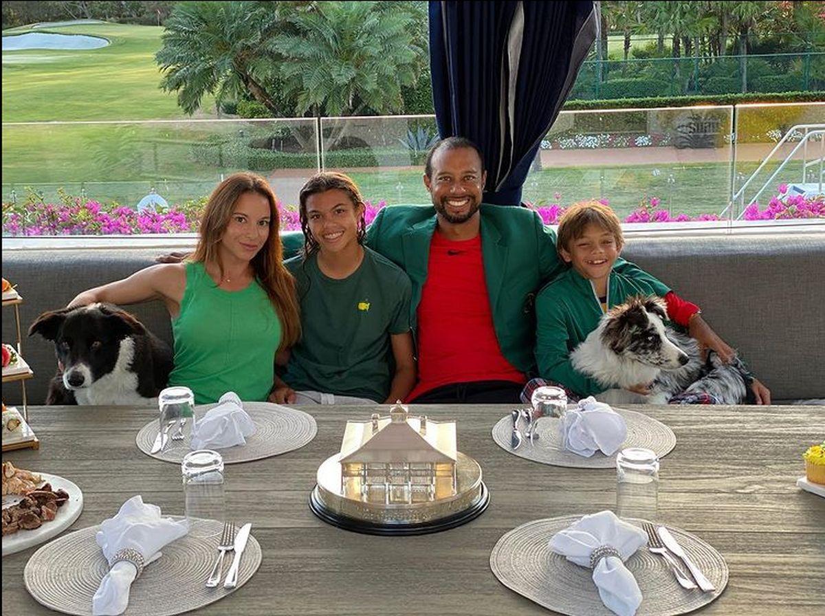 Tiger Woods with his girlfriend and children Sam Alexis and Charlie Axel after defending the Augusta Masters last April.