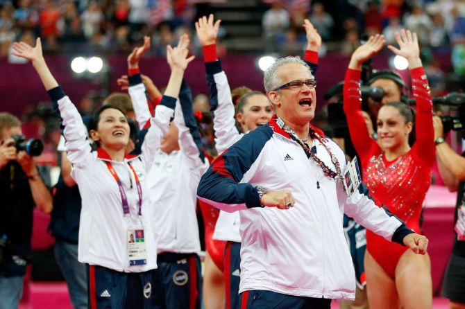 United States women's gymnastics coach John Geddert celebrates at the London 2012 Olympic Games