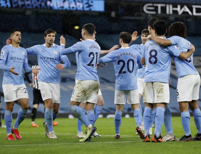 Manchester City players celebrate