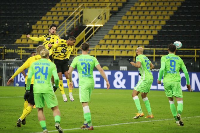 Borussia Dortmund's Manuel Akanji scores their first goal during the Bundesliga match against VfL Wolfsburg at Signal Iduna Park in Dortmund on Sunday.
