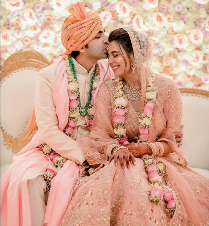 Pankaj Advani kisses his bride Saniya Shadadpuri at their wedding ceremony in Mumbai on Wednesday