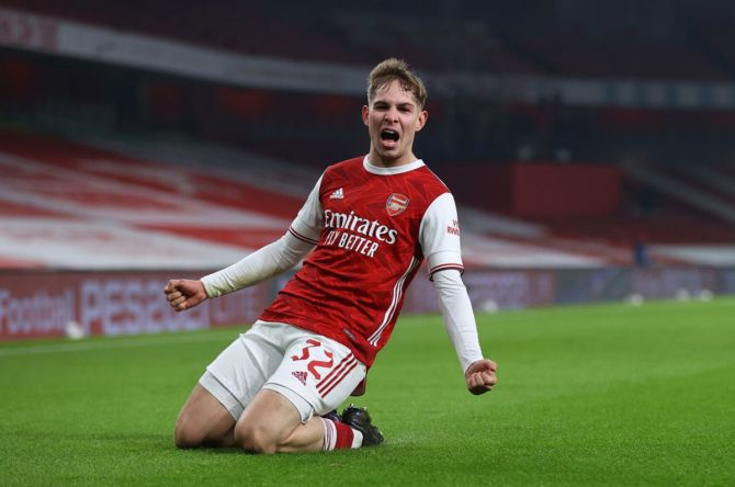 Emile Smith Rowe celebrates after scoring Arsenal's first goal during the FA Cup third round match against Newcastle United, at Emirates Stadium, on Saturday.