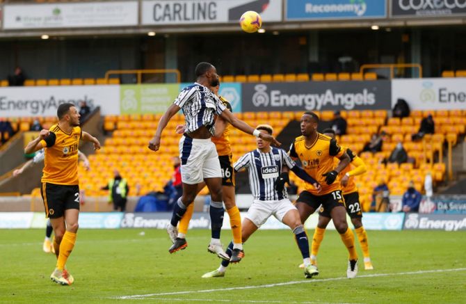 Semi Ajayi scores West Bromwich Albion's second goal against Wolverhampton Wanderers.