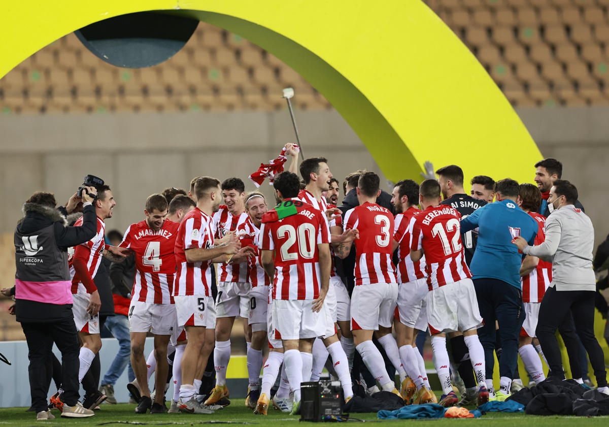 Athletic Bilbao players celebrate after the match.