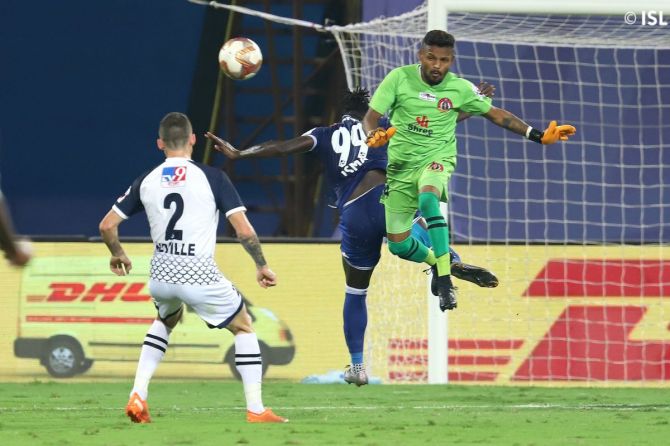 East Bengal's Debjit Majumdar pullb off a save during their match against Chennaiyin FC at Bambolim on Monday