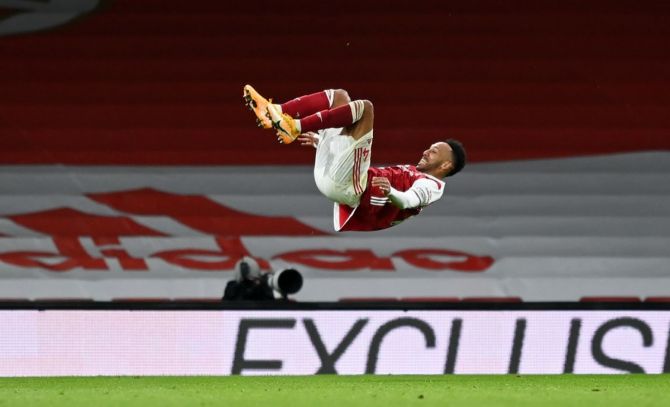 Pierre-Emerick Aubameyang celebrates scoring Arsenal's first goal during the Premier League match against Newcastle United