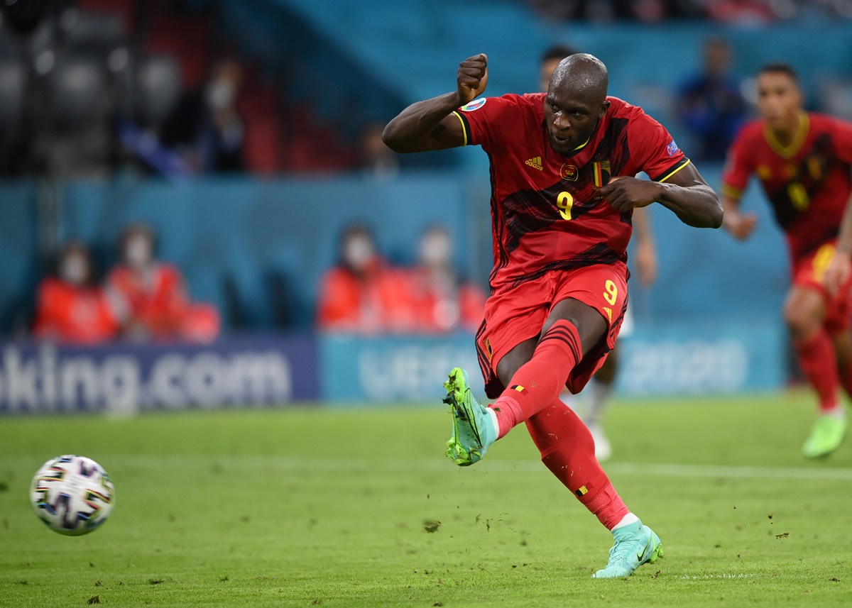 Romelu Lukaku pulls a goal back for Belgium, scoring from the penalty spot.