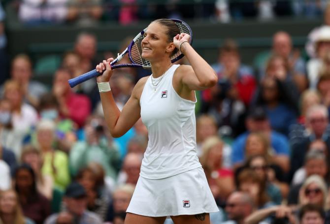 The Czech Republic's Karolina Pliskova celebrates victory over Switzerland's Viktorija Golubic.