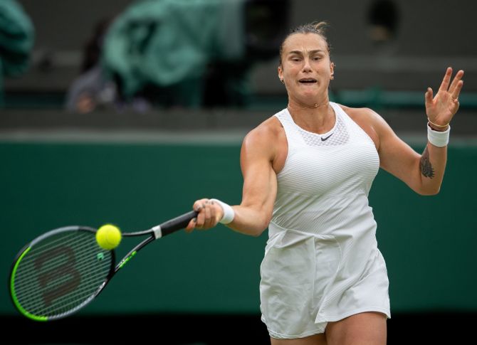 Belarus's Aryna Sabalenka plays a forehand during her women's singles quarter-final against Tunisia's Ons Jabeur.