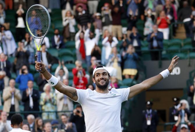 Italy's Matteo Berrettini celebrates victory over Canada's Felix Auger Aliassime in the quarter-finals.