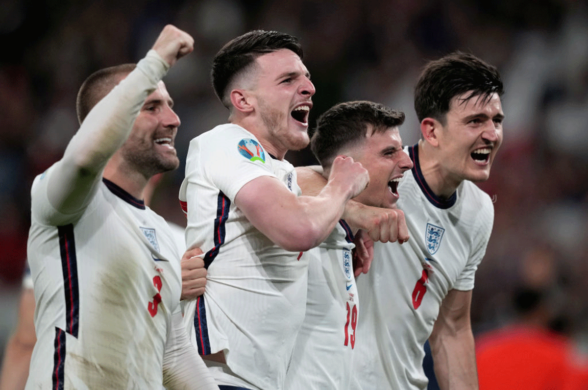 England's Luke Shaw, Declan Rice, Mason Mount and Harry Maguire celebrate after their win over Denmark on Wednesday