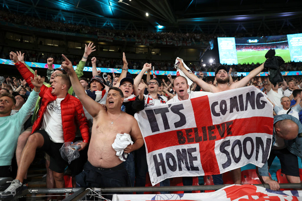 England fans celebrate at the Wembley Stadium on Wednesday. 'I think the stadiums are being correctly managed ... (but) the fact that we've got the whole nation now celebrating -- and rightly so -- it's scary' 