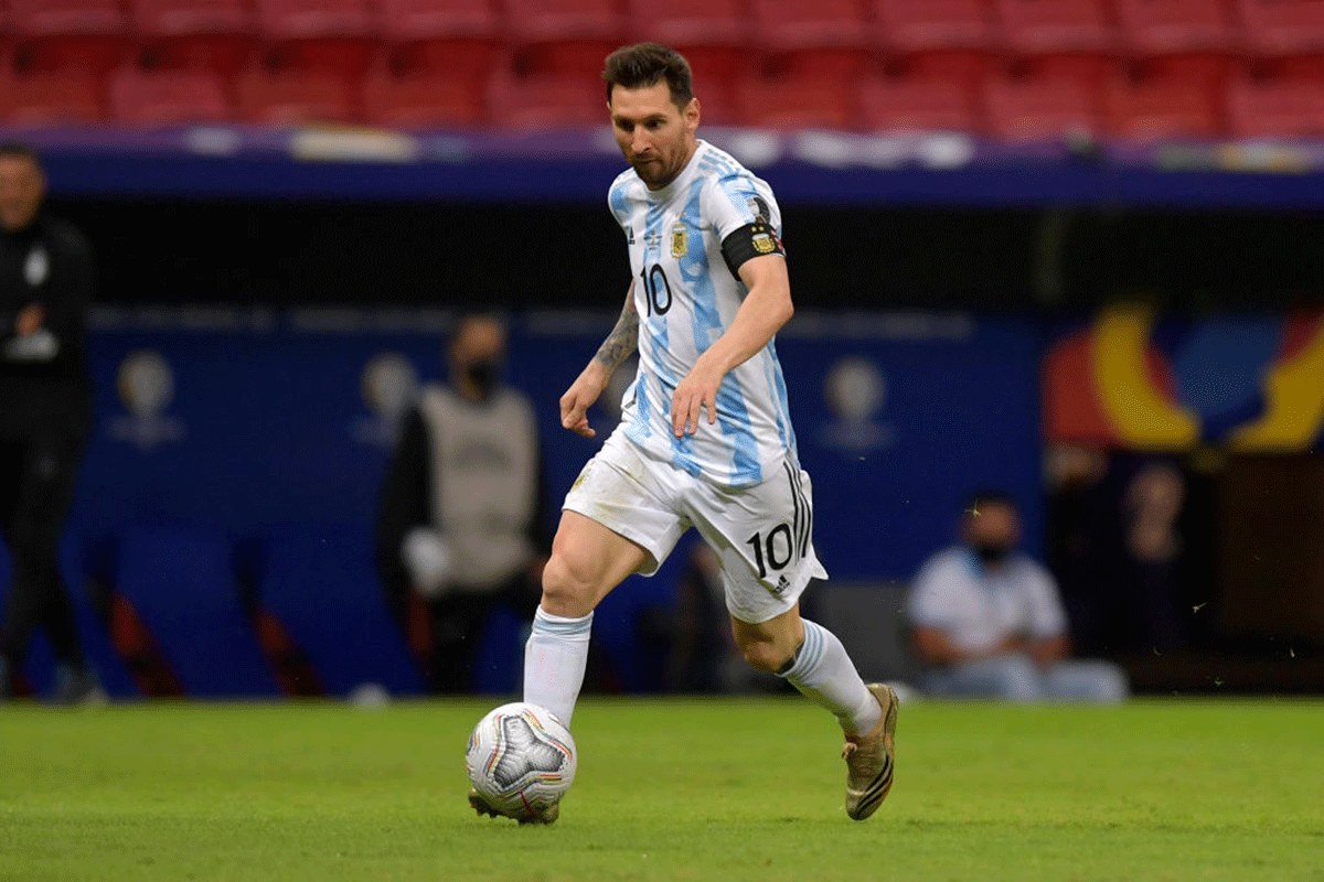 Argentina's Lionel Messi is on the ball during their group A match against Paraguay on June 21, 2021