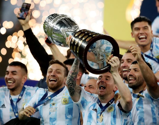 Lionel Messi lifts the trophy after Argentina's 1-0 victory over Brazil in the final of Copa America Brazil, at Maracana stadium in Rio de Janeiro, Brazil, on Saturday