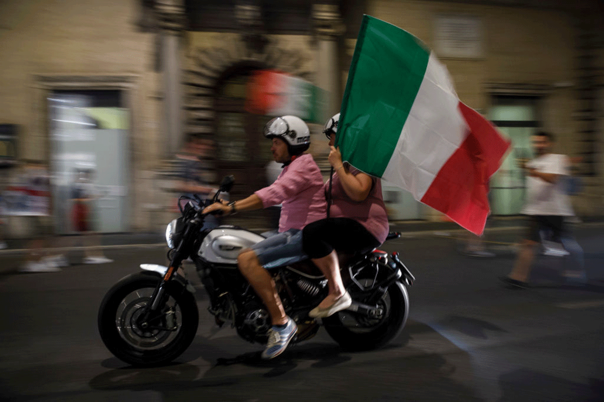 Italian football fans celebrate in Rome.
