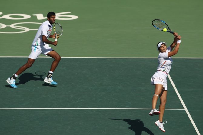 India's Rohan Bopanna and Sania Mirza in action during the mixed doubles bronze medal match against the Czech Republic's Radek Stepanek and Lucie Hradecka at the 2016 Olympics, in Rio de Janeiro, Brazil.