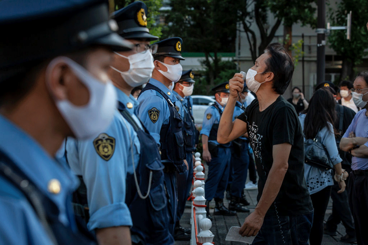 A protester demonstrates against the forthcoming Tokyo Olympic Games in Tokyo