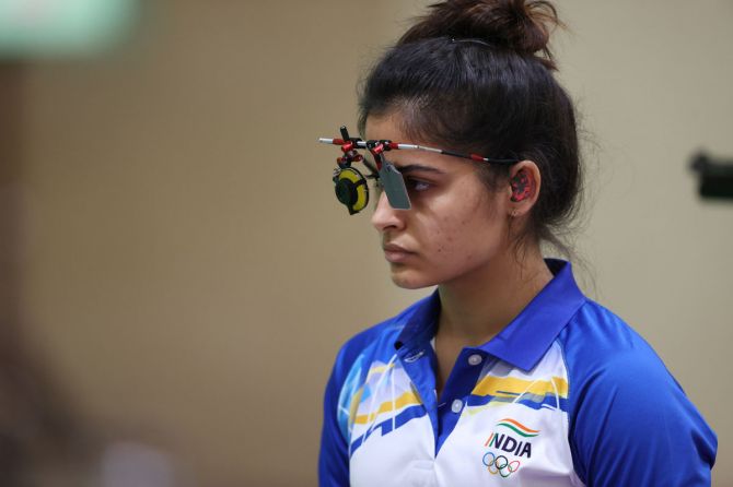 India's Manu Bhaker watches helplessly as her gun malfunctions during the 10m Air Pistol women's event at the Tokyo Olympics on Sunday.