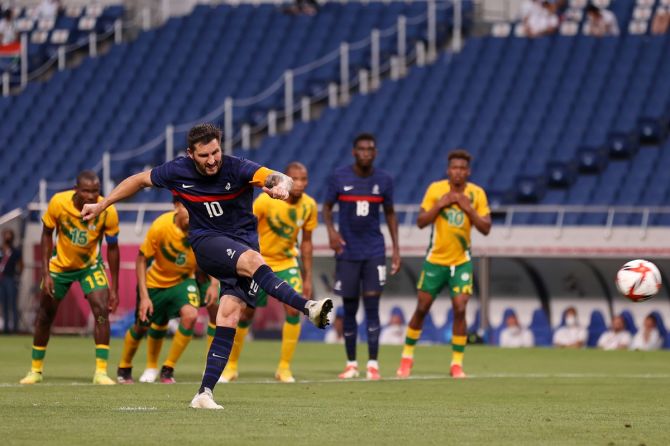Andre-Pierre Gignac scores France's third goal from the penalty spot against South Africa