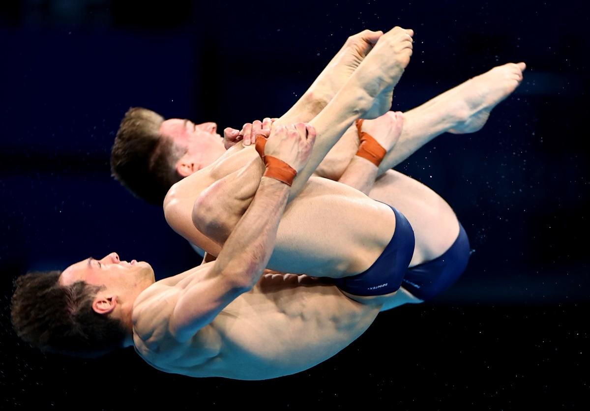 Britain's Thomas Daley and Matty Lee perform during the men's 10m Platform Synchro final, at Tokyo Aquatics Centre. 