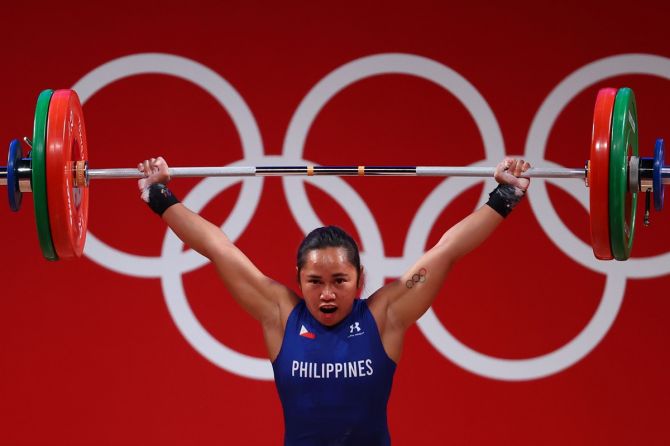 Hidilyn Diaz of the Philippines in action during the women's 55kg weightlifting competiton at Tokyo International Forum. 