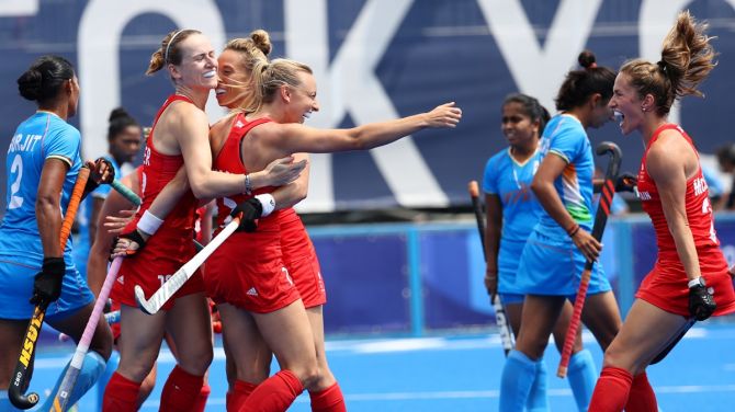 Hannah Martin celebrates with teammates after scoring Great Britain's second goal