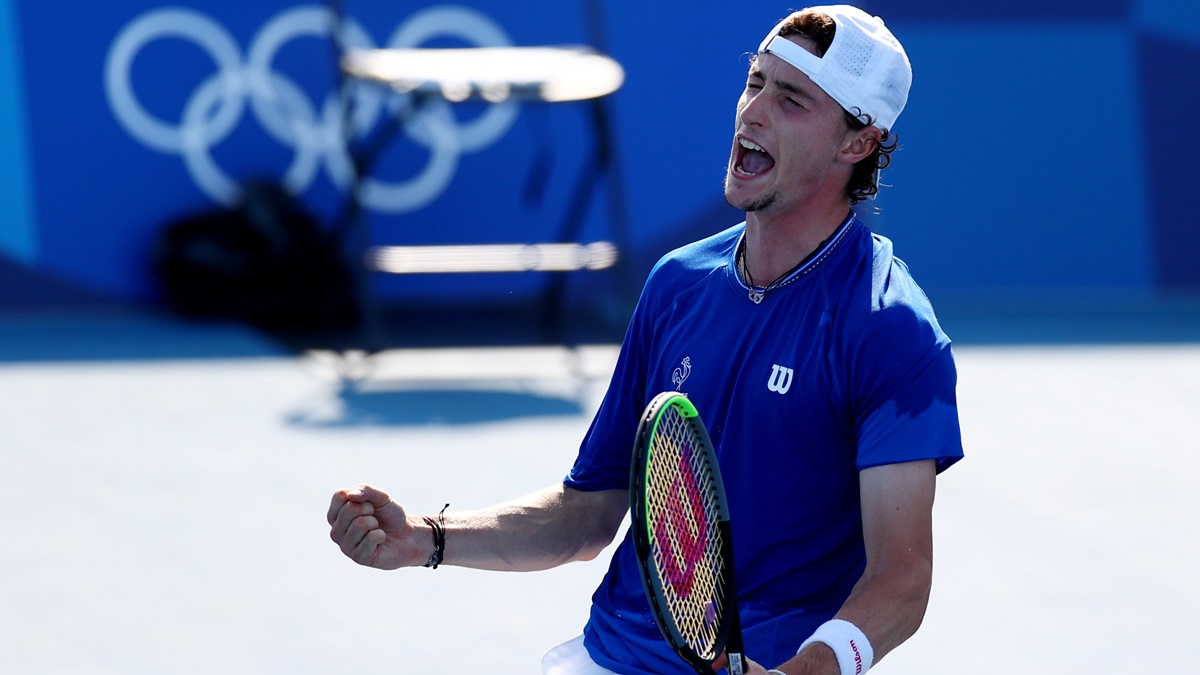 France's Ugo Humbert celebrates after winning his third round match against Greece's Stefanos Tsitsipas.